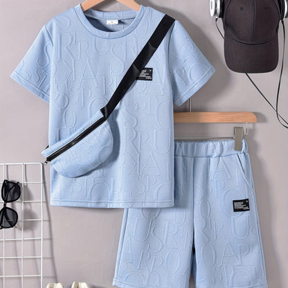 Տղաների համար նախատեսված ոճային սպիտակ կարճ թևքով մարզաշապիկ + առօրյա շորտեր + նորաձև կրծկալով պայուսակի հավաքածու, իդեալական է բացօթյա օգտագործման համար