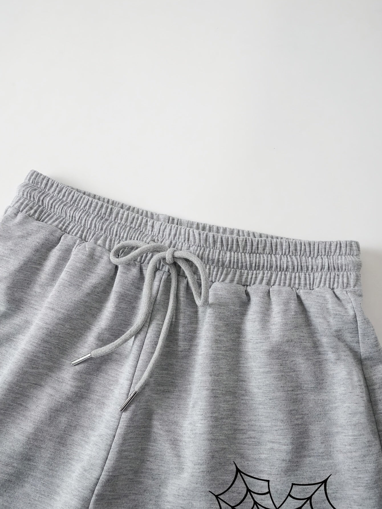 Կանացի սպորտային շորտեր, 100% պոլիեսթեր տրիկոտաժե գործվածք, մուլտֆիլմ սարդոստայնի նախշ, թեթև 250 գ/մ², բազմակողմանի գարուն/ամառ/աշուն