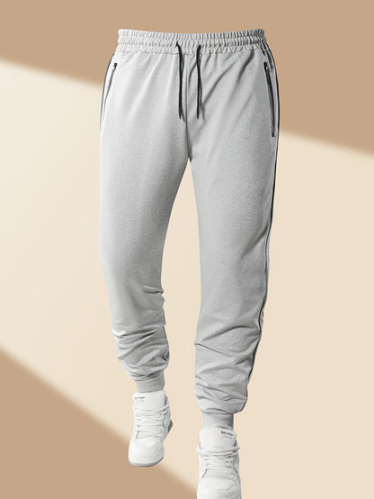 Տղամարդու առօրյա սպորտային հագուստի հավաքածու՝ Գարուն/աշուն՝ կանգնած օձիքով բաճկոն, երկու մասից բաղկացած հավաքածու՝ ժապավենով ձգվող առաձգական գոտկատեղով տաբատով, տղամարդու վերին և ստորին հագուստ վազքի համար, կայծակաճարմանդով գրպանի դիզայն