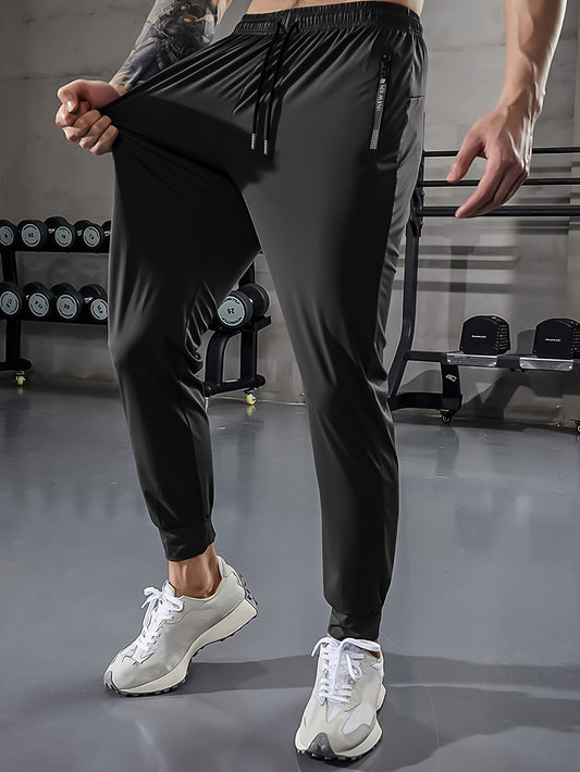 Men'S Athletic Stretch Pants with Adjustable Drawstring Waist, Featuring Zippered Pockets And Solid Color, Quick-Dry Joggers, Perfect for Fitness And Running Workouts.