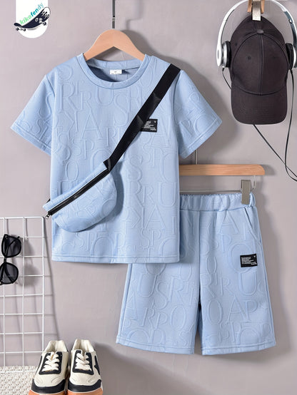 Տղաների համար նախատեսված ոճային սպիտակ կարճ թևքով մարզաշապիկ + առօրյա շորտեր + նորաձև կրծկալով պայուսակի հավաքածու, իդեալական է բացօթյա օգտագործման համար