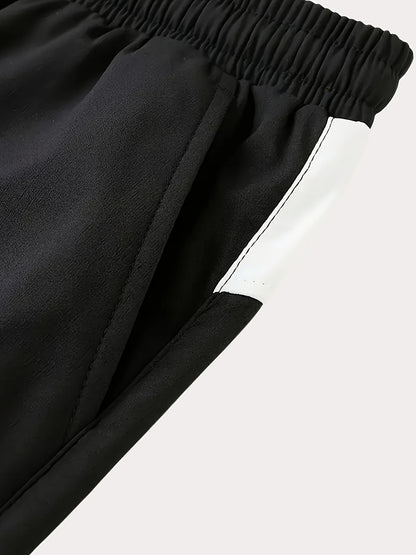 Գարնան և աշնան համար նախատեսված սպորտային հագուստի համալիր, որը ներառում է կանգնած օձիքով և սև ու սպիտակ գծավոր երկար տաբատով ճարմանդով բաճկոն, ոճային հանդերձանք, որը հիանալի նվեր է, քրտինքից պաշտպանված, միայն ձեռքով լվանալ, մարզումների համար աքսեսուար: