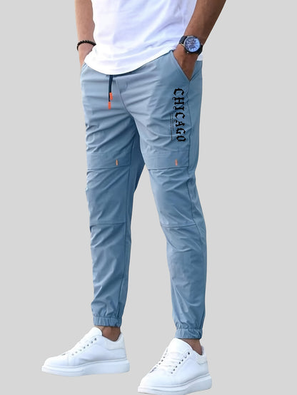 Տղամարդկանց պատահական պարաններով ջոջեր, 100% պոլիեսթեր չձգվող գործվածք, այբուբենի տպագրությամբ դետալներով սովորական տաբատ, 100% պոլիեսթեր, նորաձև աշխատանքային հագուստ