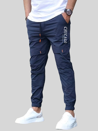 Տղամարդկանց պատահական պարաններով ջոջեր, 100% պոլիեսթեր չձգվող գործվածք, այբուբենի տպագրությամբ դետալներով սովորական տաբատ, 100% պոլիեսթեր, նորաձև աշխատանքային հագուստ