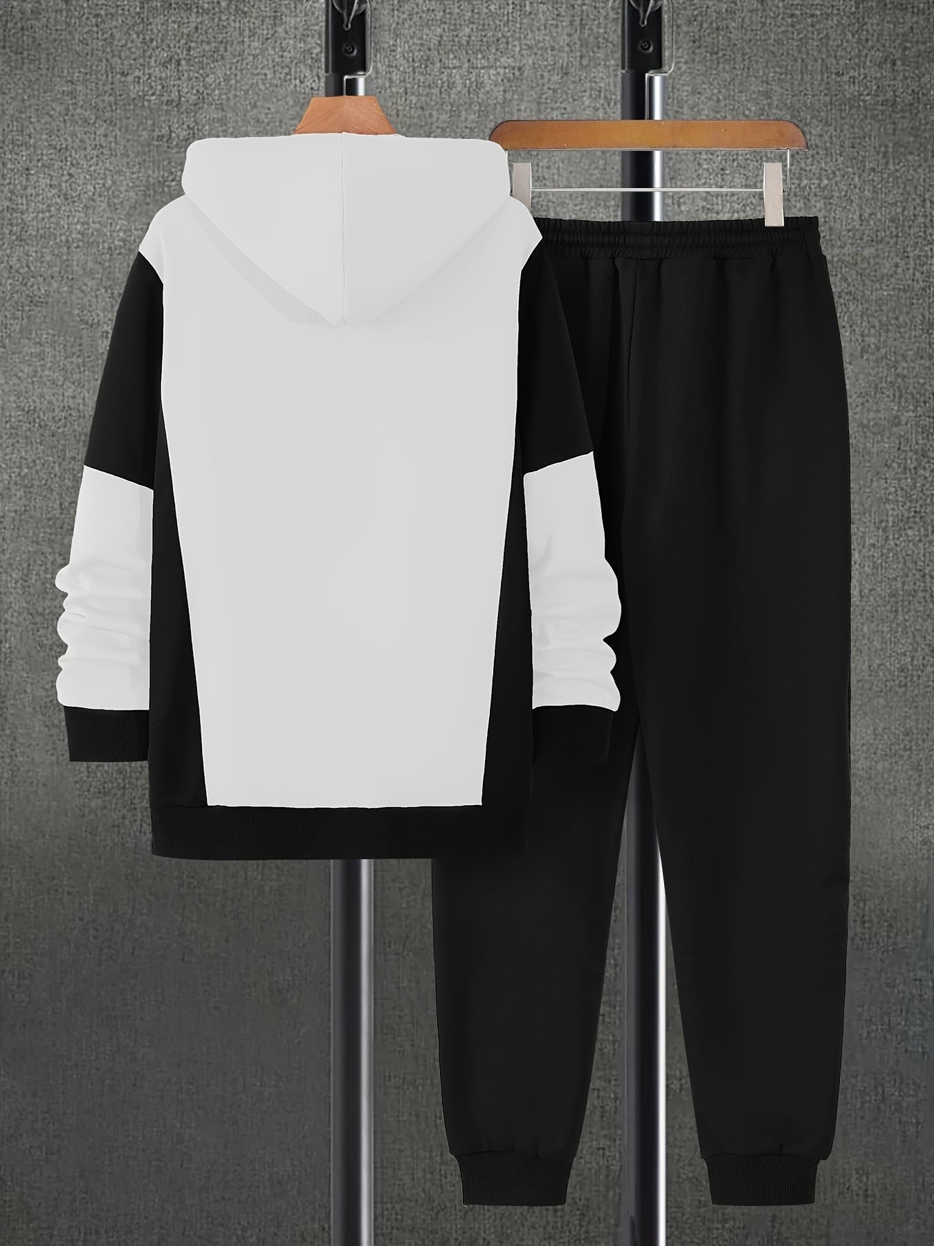 Տղամարդու աշնանային գունային համադրություններով, կայծակաճարմանդով վերնաշապիկ՝ կողային գրպաններով և միագույն երկար տաբատի լարով հավաքածու։