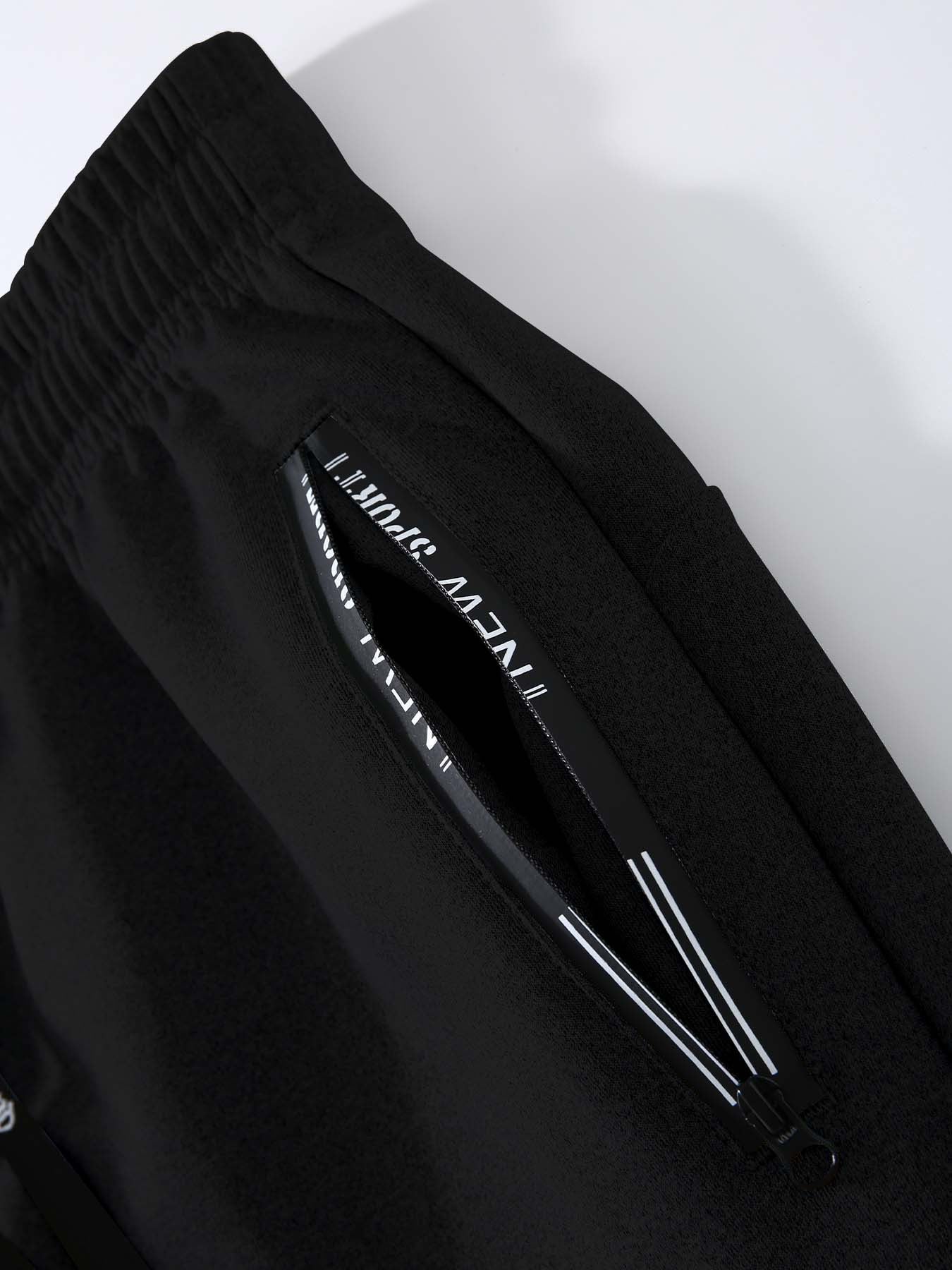 Տղամարդու նորաձև երկկտոր բաճկոնի և սպորտային տաբատի հավաքածու՝ մուգ կապույտ գույնի, ոճային նախշերով, առօրյա երիտասարդական սպորտային հագուստ, կայծակաճարմանդ դետալով, երկար թևքերով, նեղ չափսերով, աշուն/ձմեռ հավաքածու