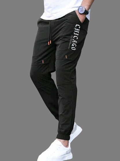 Տղամարդկանց պատահական պարաններով ջոջեր, 100% պոլիեսթեր չձգվող գործվածք, այբուբենի տպագրությամբ դետալներով սովորական տաբատ, 100% պոլիեսթեր, նորաձև աշխատանքային հագուստ