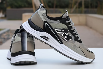 Տղամարդկանց շնչող ցանցե վազքի սպորտային կոշիկներ՝ ամուր, հակասահք, հոտակայուն, ռետինե ներբանով, գարնանային աշնան համար նախատեսված, ցածր, կապիչով դիզայնով, սպիտակ, սև և կանաչ գույներով։