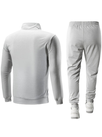 Տղամարդու առօրյա սպորտային հագուստի հավաքածու՝ Գարուն/աշուն՝ կանգնած օձիքով բաճկոն, երկու մասից բաղկացած հավաքածու՝ ժապավենով ձգվող առաձգական գոտկատեղով տաբատով, տղամարդու վերին և ստորին հագուստ վազքի համար, կայծակաճարմանդով գրպանի դիզայն