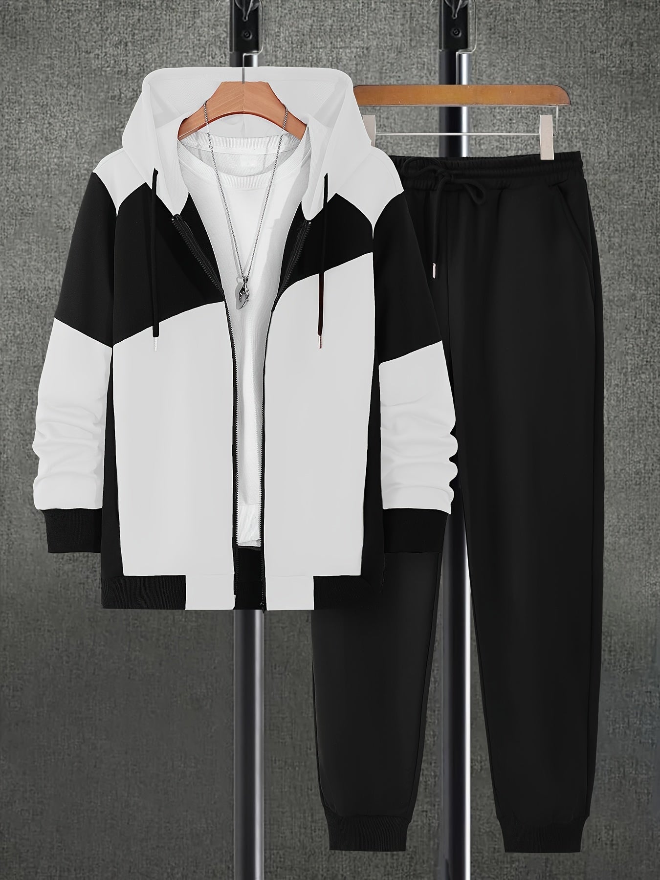 Տղամարդու աշնանային գունային համադրություններով, կայծակաճարմանդով վերնաշապիկ՝ կողային գրպաններով և միագույն երկար տաբատի լարով հավաքածու։