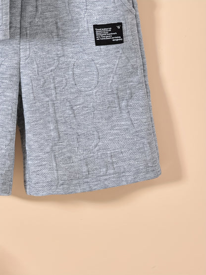 Տղաների համար նախատեսված ոճային սպիտակ կարճ թևքով մարզաշապիկ + առօրյա շորտեր + նորաձև կրծկալով պայուսակի հավաքածու, իդեալական է բացօթյա օգտագործման համար