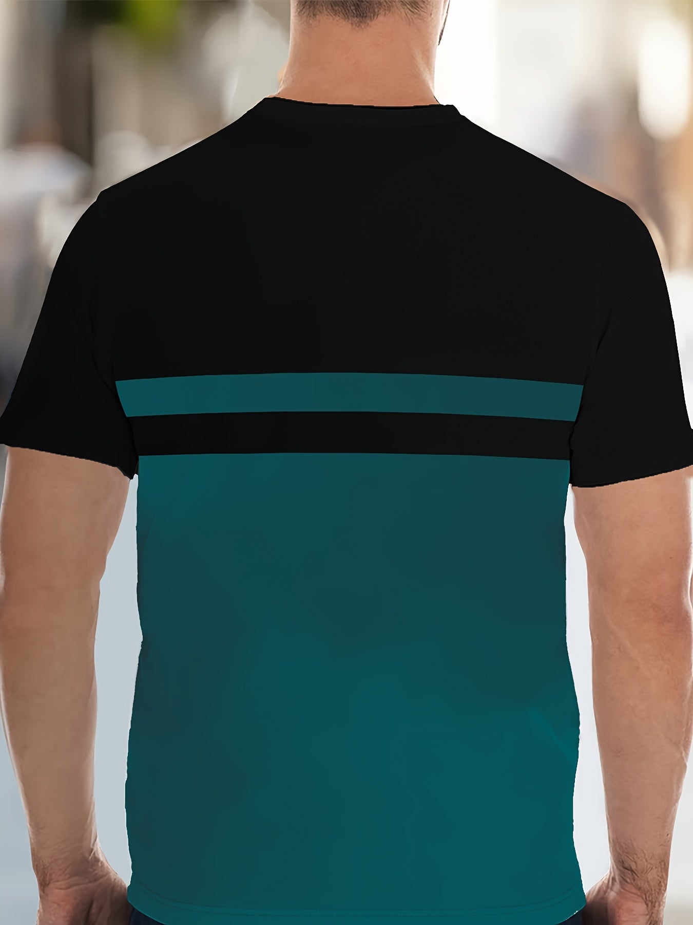 Տղամարդու նորաձև շապիկ - սև, կապտականաչավուն գույնի նախշերով, կարճ թևքերով, կանոնավոր չափսերով, պոլիեսթերային գործվածքով, իդեալական է առօրյա հագուստի համար, նորաձև շապիկ