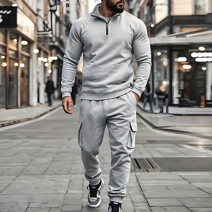 Բազմակողմանի համույթ, տղամարդկանց համար նախատեսված առօրյա 2 հատանոց հավաքածու. Բարձր վզնոցով ծանր, կայծակաճարմանդով սվիտեր և գրպաններով աշխատանքային տաբատ՝ միագույն, փափուկ գործվածքից՝ աշուն/ձմեռ համար